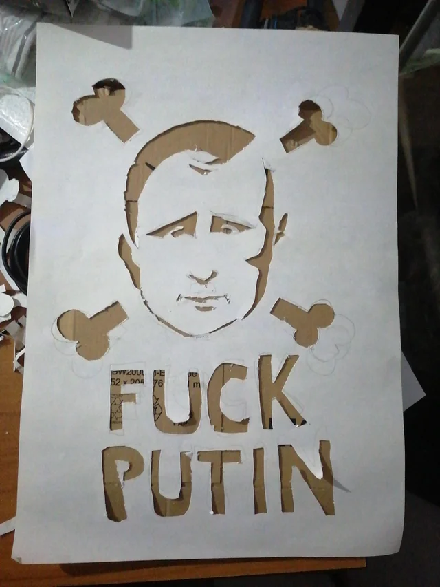 Image of putin with text 'fuck putin'
